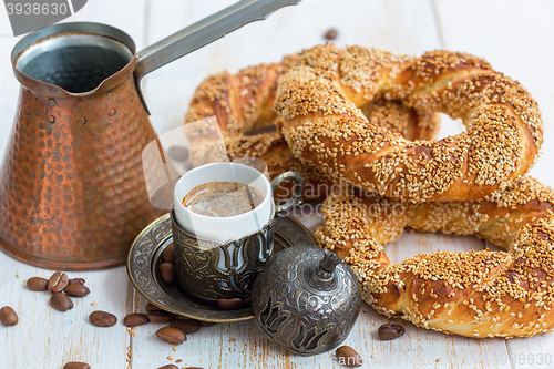 Image of Breakfast with black coffee and Turkish bagels.