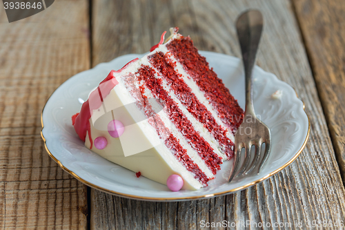 Image of Piece of cake Red velvet on a plate closeup.