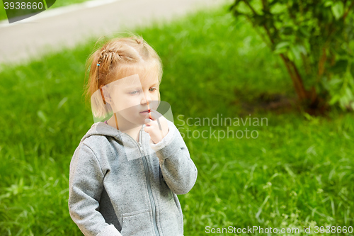 Image of Portrait of a Thoughtful LIttle Girl