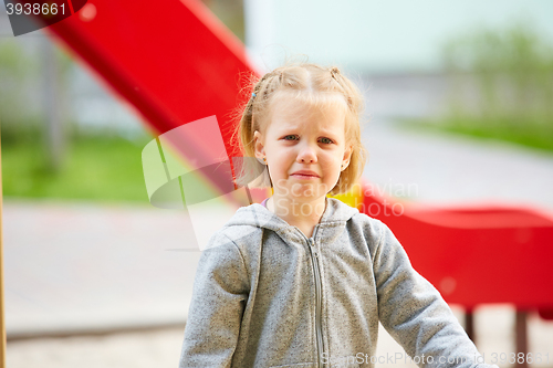 Image of Beautiful sad little girl crying