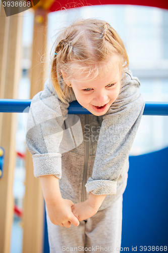 Image of girl playing at the playground