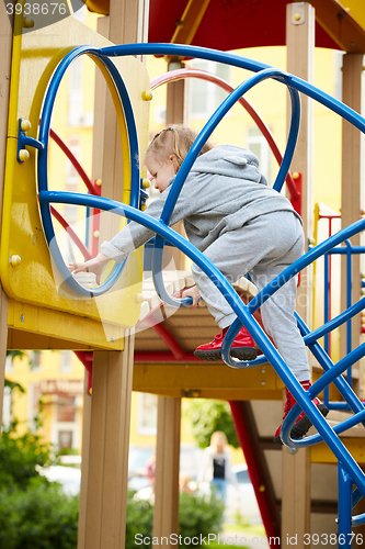 Image of girl playing at the playground