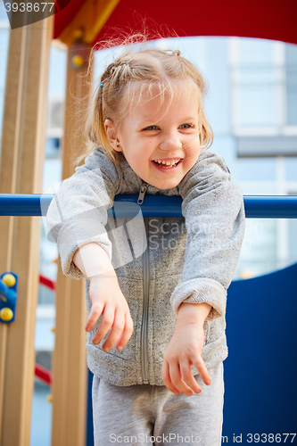 Image of girl playing at the playground