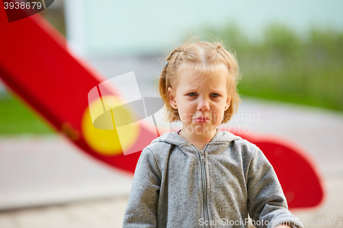 Image of Beautiful sad little girl crying