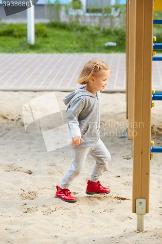 Image of girl playing at the playground