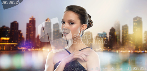 Image of beautiful young asian woman with earring