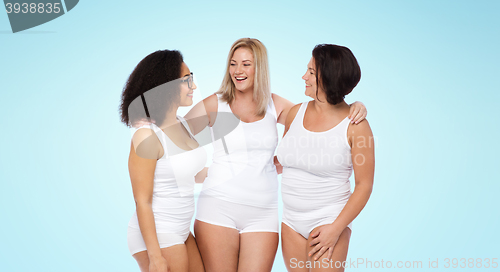 Image of group of happy plus size women in white underwear