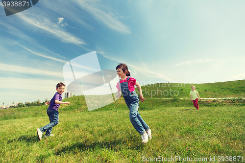 Image of group of happy kids running outdoors