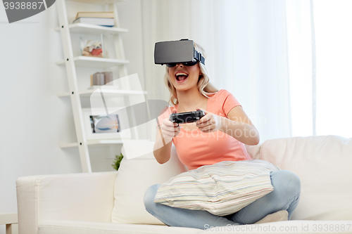 Image of woman in virtual reality headset with controller