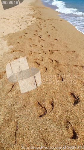 Image of Footsteps on the beach by the sea