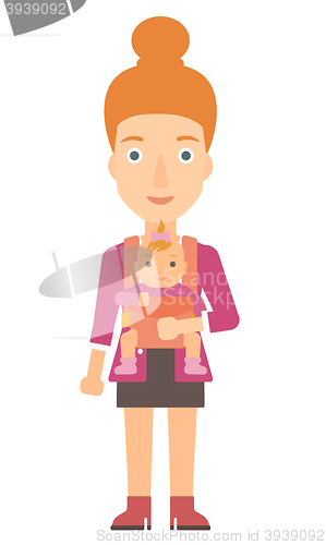 Image of Woman holding baby in sling.