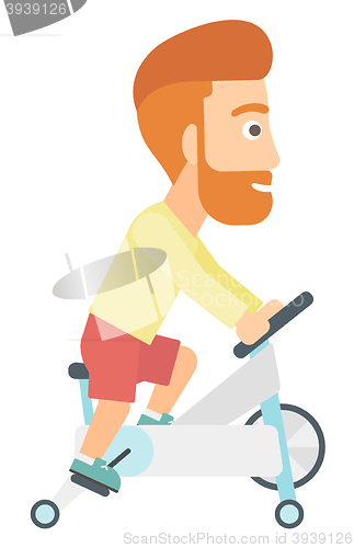 Image of Man doing cycling exercise.