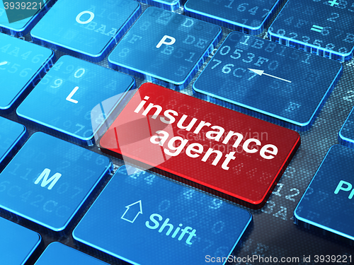Image of Insurance concept: Insurance Agent on computer keyboard background