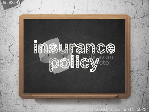 Image of Insurance concept: Insurance Policy on chalkboard background