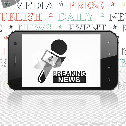 Image of News concept: Smartphone with Breaking News And Microphone on display