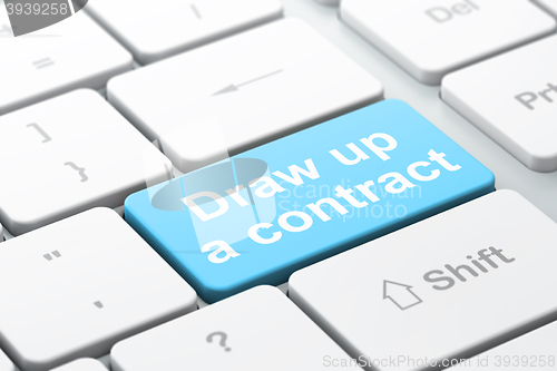 Image of Law concept: Draw up A contract on computer keyboard background
