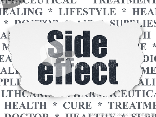 Image of Medicine concept: Side Effect on Torn Paper background