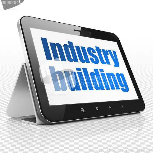 Image of Manufacuring concept: Tablet Computer with Industry Building on display