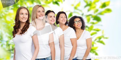 Image of group of happy different women in white t-shirts