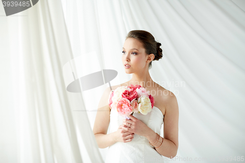 Image of beautiful asian woman with flower and jewelry