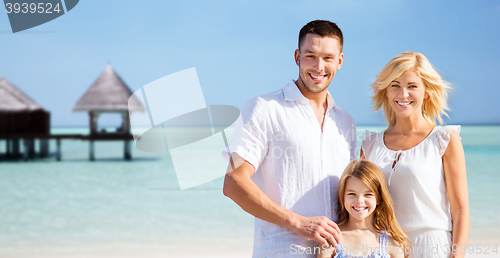 Image of happy family over tropical beach with bungalow