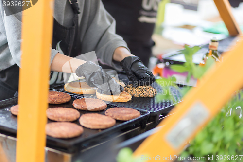Image of Beef burgers ready to serve on food stall.