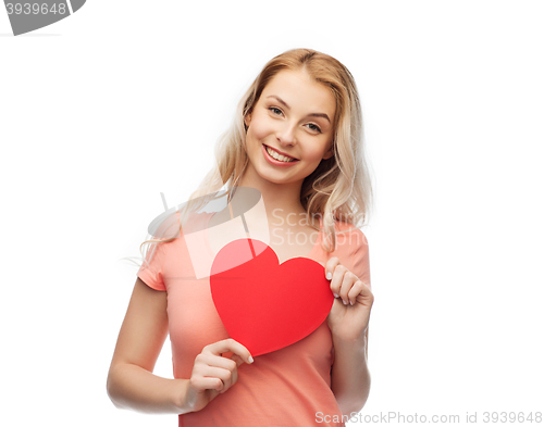 Image of happy woman or teen girl with red heart shape