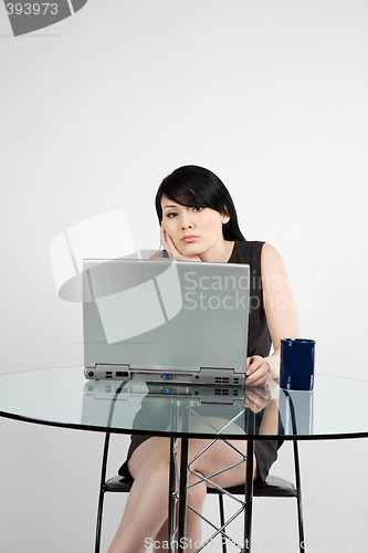 Image of Working businesswoman