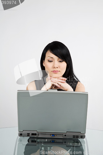 Image of Working businesswoman