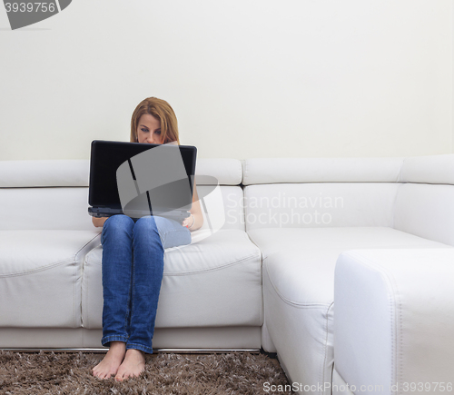 Image of Woman Using a Laptop