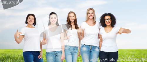 Image of group of happy different women in white t-shirts