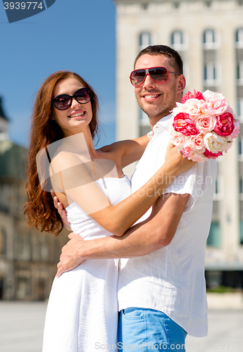 Image of smiling couple in city