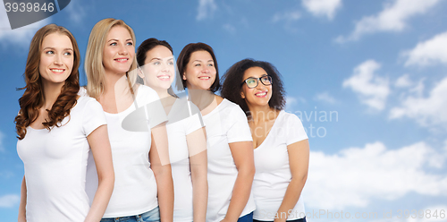 Image of group of happy different women in white t-shirts