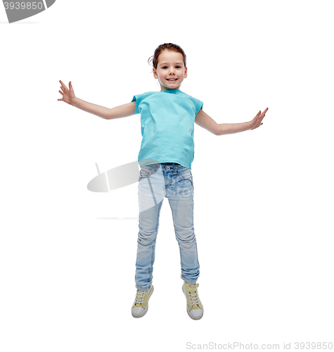 Image of happy little girl jumping in air