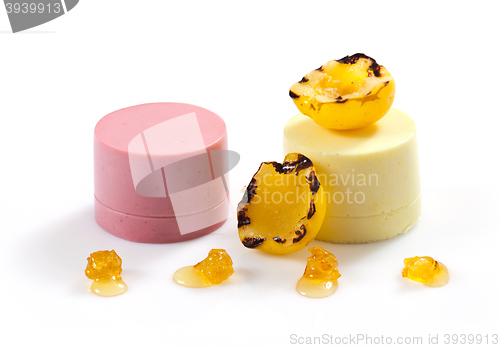 Image of portion of two various dessert creams 