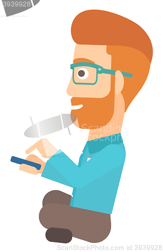 Image of Man using mobile phone.