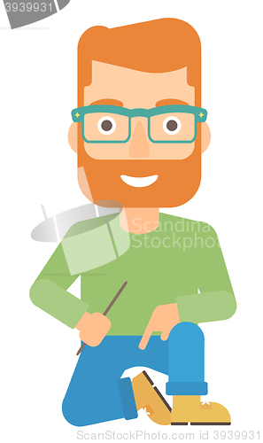 Image of Smiling man sitting.