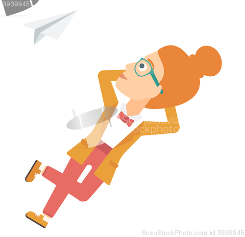 Image of Business woman relaxing on cloud.