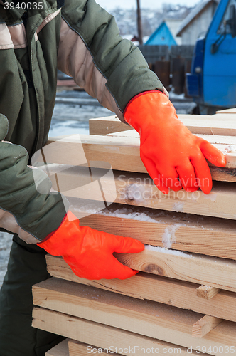 Image of Carpenter working at sawmill 