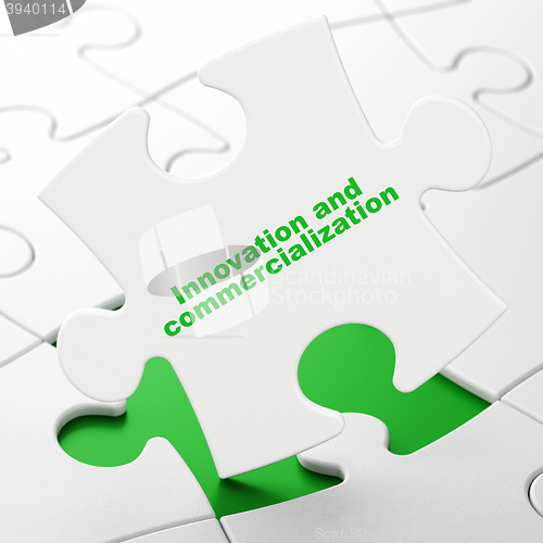 Image of Science concept: Innovation And Commercialization on puzzle background