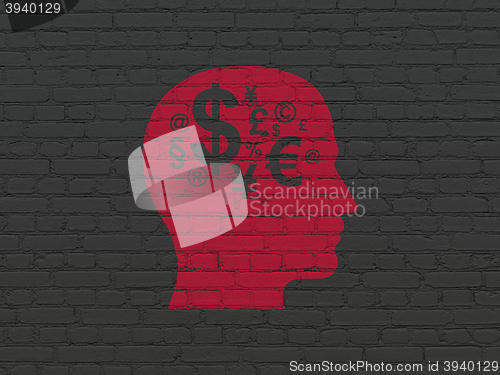 Image of Advertising concept: Head With Finance Symbol on wall background