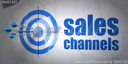 Image of Advertising concept: target and Sales Channels on wall background