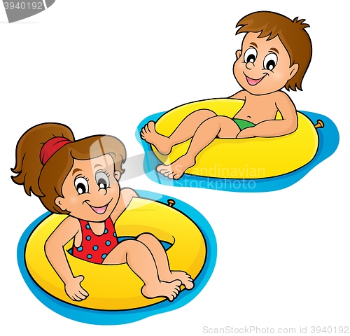Image of Children in swim rings image 1