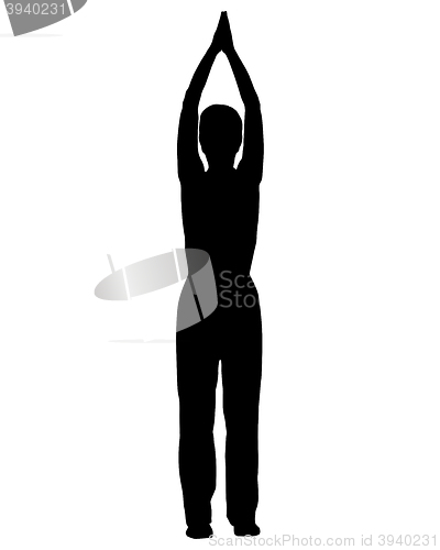 Image of Silhouette of woman doing yoga