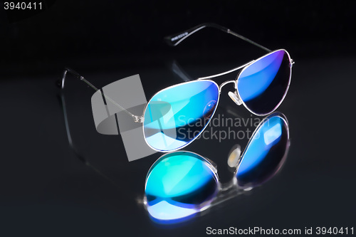 Image of colored sunglasses.