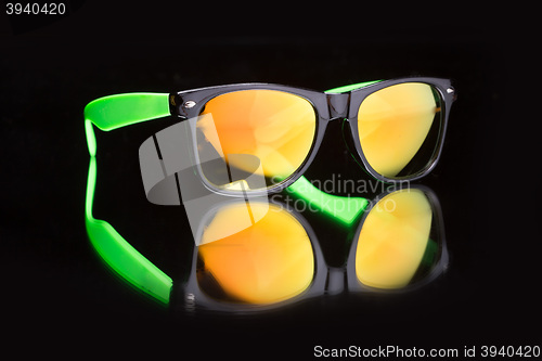 Image of colored sunglasses.