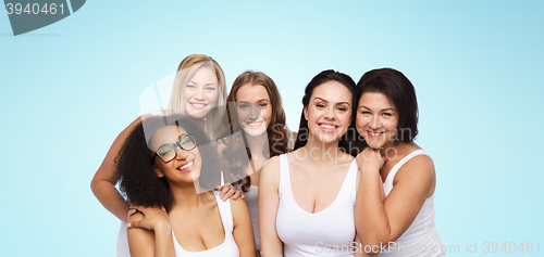 Image of group of happy different women in white underwear