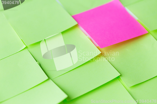 Image of close up of different color paper stickers