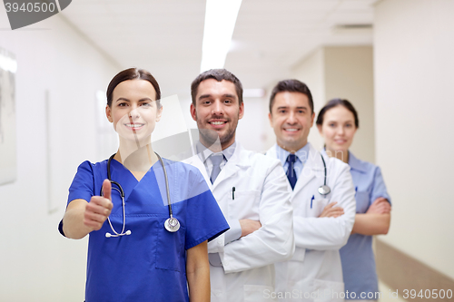 Image of medics or doctors at hospital showing thumbs up