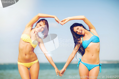 Image of girls having fun on the beach